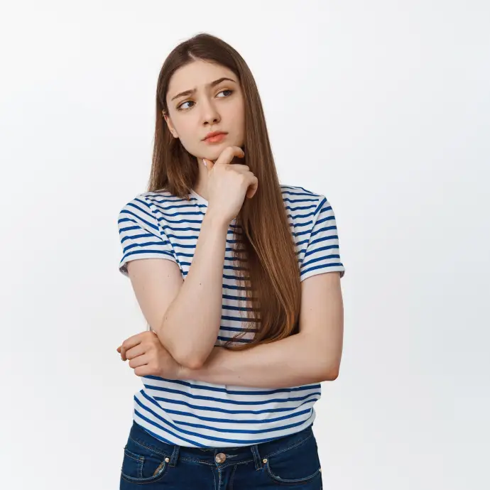 Confident patient with restored smile from dental crowns