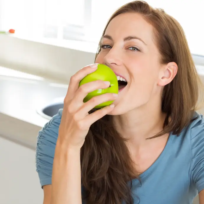 Patient eating comfortably after dental filling